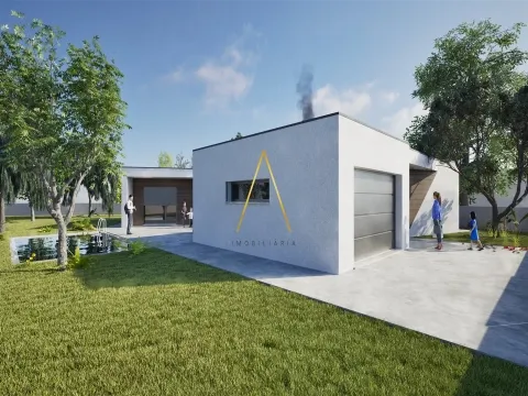 Moradia Isolada T4, inserida em 1352 m2 de terreno.