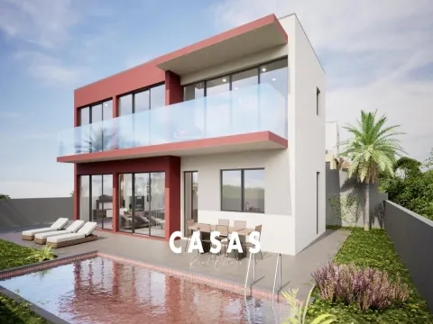 Lote de terreno com 870m2 e com projeto aprovado para construção de duas moradias na Ponta Do Pargo