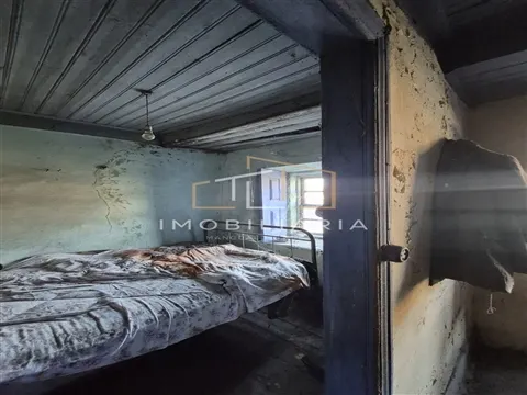 Casa Rústica em pedra e madeira