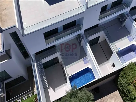 Moradia V3+1 de arquitetura contemporânea em Gambelas, Faro